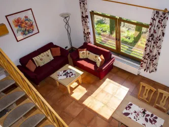 Blick von oben auf das Wohnzimmer