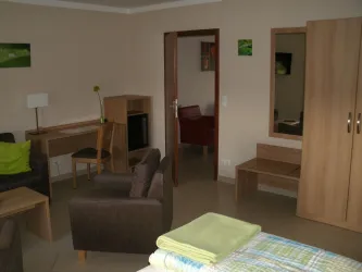 Schlafzimmer mit Wohnbereich 2 (© Urlaubsregion Freinsheim)