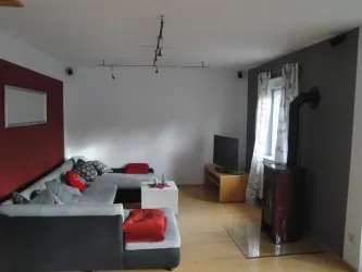 Wohnzimmer mit Ofen (© Matthäus Burkhart)